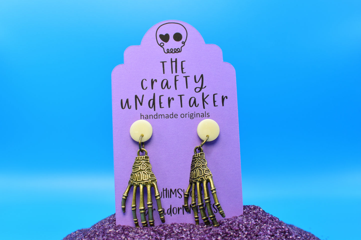 spooky brass hands + GLOW stud