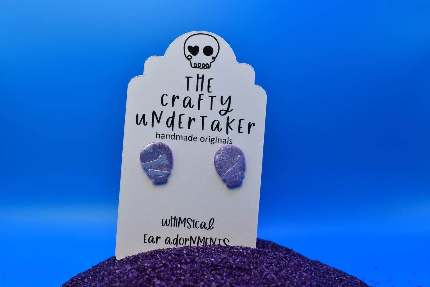 spooky shimmer skull + bone stud