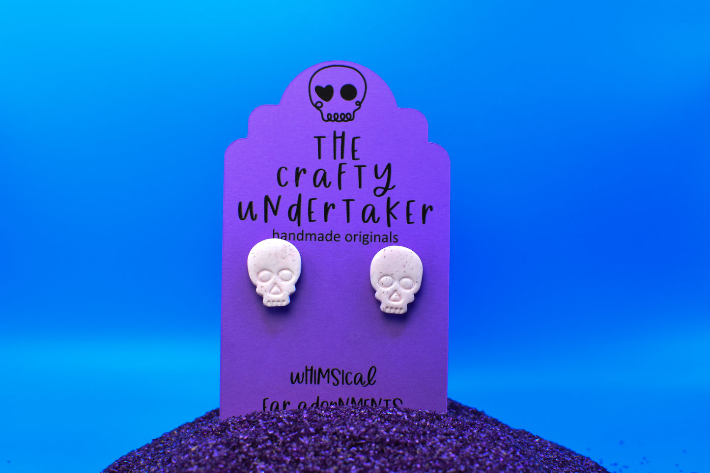 spooky pink skull stud